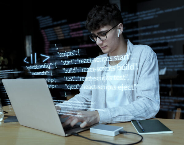 programming-background-with-person-working-with-codes-computer